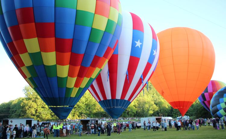Spectators and balloon crews gather in Helen for the 53rd annual Helen to the Atlantic Balloon Race & Festival on June 4. Around 20 balloons are participating in events throughout the weekend. CARLY HENDERSON/WCN