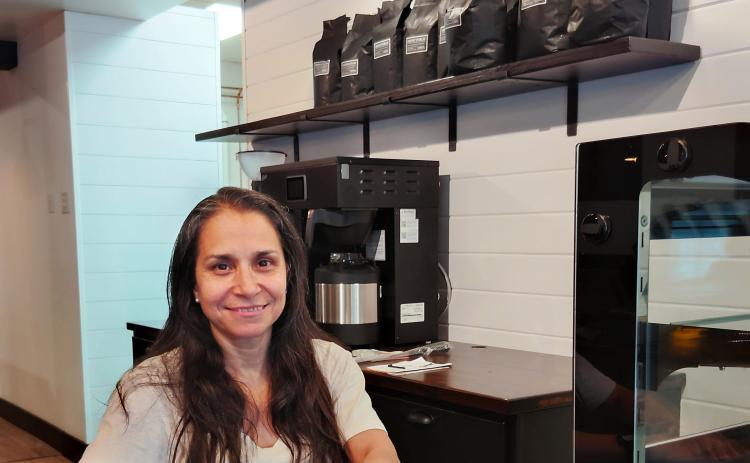 Marilyn Martin and her husband Stephen Martin, not pictured, own Farmhouse Coffee in Cleveland. The coffee shop will open its larger space on Friday, June 12. DENISE ETHERIDGE/WCN