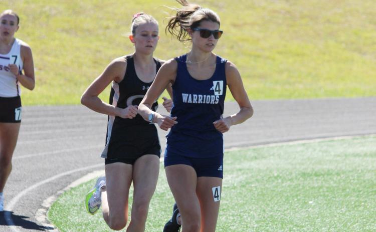 Julie Black, right, and Ellie Shelbnutt both finished as a state runner-up at the Class AAA state meet in May.  MARK TURNER/WCN