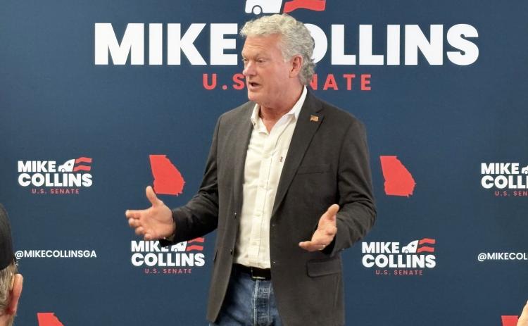 Rep. Mike Collins speaks to attendees during a May 28 meet and greet at North Georgia BBQ in White County. Collins met with voters and discussed his campaign ahead of the June 16 Republican primary runoff for U.S. Senate. CARLY HENDERSON/WCN