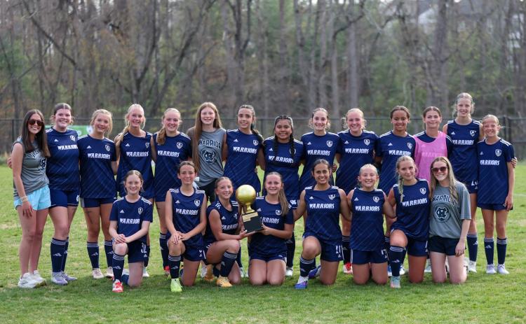 The WCMS Lady Warriors capped off a perfect season with a 4-1 win over Lumpkin County in the NGML title game.  JENNIFER KNIGHT/SPECIAL