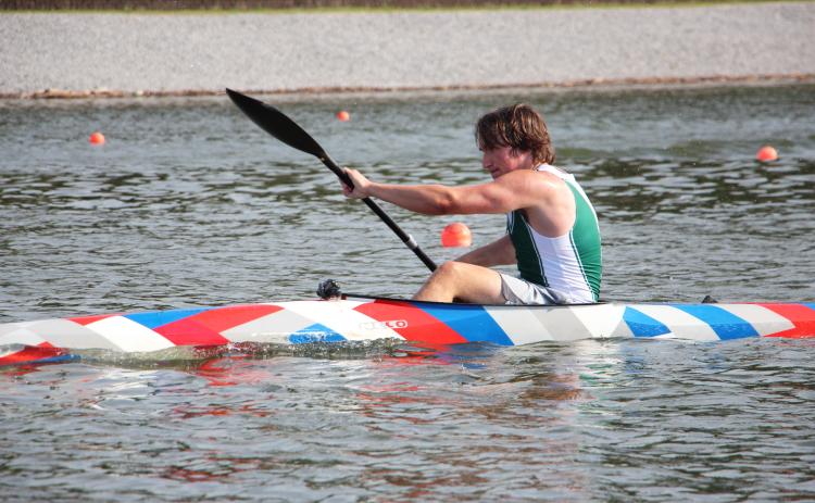 Connor Rowland, 16, a Team USA paddler, practices at Lanier Canoe & Kayak Club during a recent training session. CARLY HENDERSON/WCN