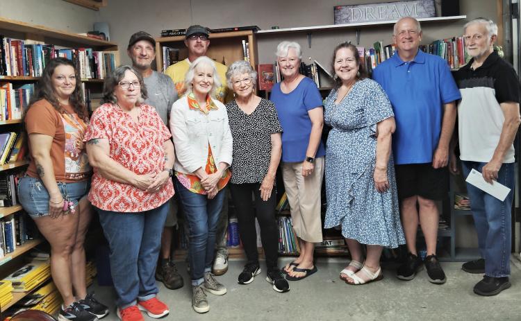 The Community Thrift Store on Highway 115 E. in Cleveland gives out grants to local nonprofits on a quarterly basis. The most recent grant presentation was on June 18. From left: Sedina Dove, Jackie McDaniel, Frank Morrell (back), Mark Thomason (back), Gail Smith, Carol Dobson, Kim Sosebee, Tammi Terrall, Tim Skidmore and Paul Veen. DENISE ETHERIDGE/WCN