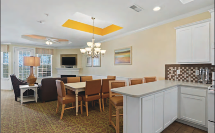 A dining room and kitchen is shown in one of the presidential penthouses, which are now long-term rentals at the Apple Mountain Golf Club and Resort, recently purchased by BQA 4 LLC. HANNAH CAUDELL/CNI
