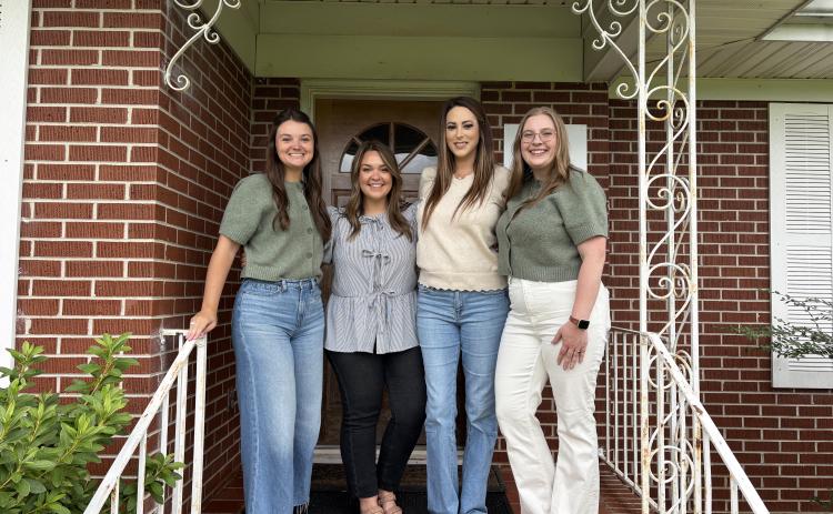 From left, Family Advocate Megan Holcombe, Family Advocate Carlyn Hearn, Forensic Interviewer Kristin Jarrard and Executive Director Victoria Dunston stand in front of South Enotah Child Advocacy Center at the meet and greet held July 22. CARLY HENDERSON/WCN