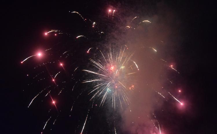 Crowds of people descended on the City of Helen to celebrate the nation's 250th Independence Day. People spread out in the city's parks on picnic blankets, tail gated in parking lots or relaxed by the Chattahoochee River. The city set off fireworks after dark from Wilkins' Field. DENISE ETHERIDGE/WCN