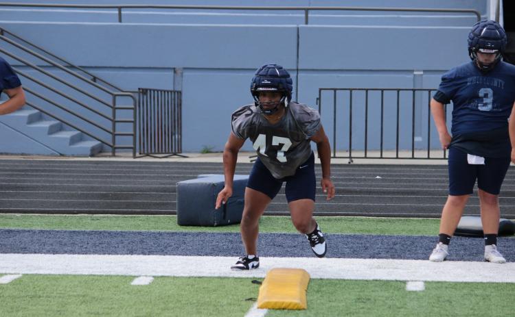WCHS lineman Josiah Williams works through a drill during a practice last week. MARK TURNER/WCN