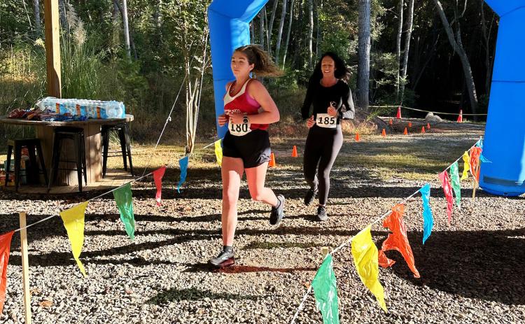 Runners Grace Pulido and Brandi Smoker participate in the 2024 NOGAWILD Safari Run. The event will return Sept. 12, with proceeds benefiting Creation Encounters. SUBMITTED PHOTO