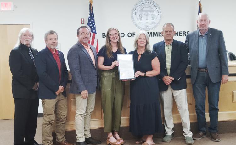 From left: Commissioners Craig Bryant and Shan Ash, Chairman Travis Turner, Ellis, Truelove, and Commissioners Lyn Holcomb and Ed Nix. DENISE ETHERIDGE/WCN
