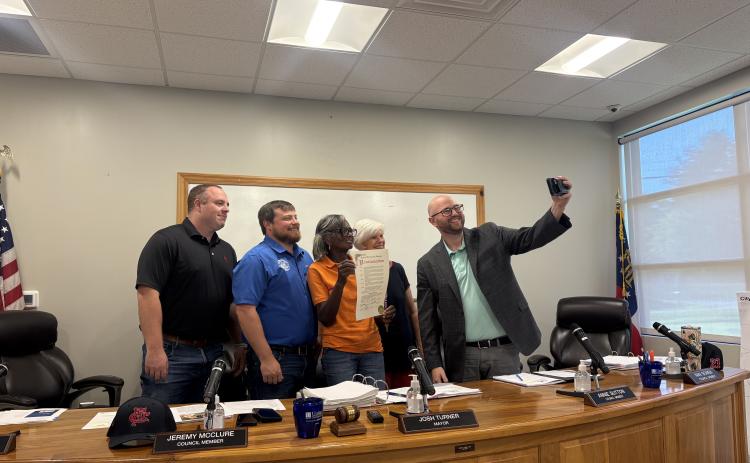 Cleveland City Council members pose for a selfie following the approval of a proclamation recognizing Tuesday, Aug. 11, as City Hall Selfie Day during the council's Aug. 17 meeting. The proclamation celebrates local government and public service and Cleveland's transition to the new Cleveland Municipal Complex at 55 Cantrell Road. CARLY HENDERSON/WCN
