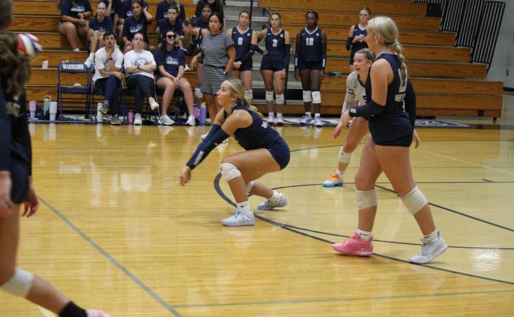Daylee Barrett, above, and the Lady Warriors went 4-0 at the Class AAAA Playdate last weekend in Watkinsville.  MARK TURNER/WCN