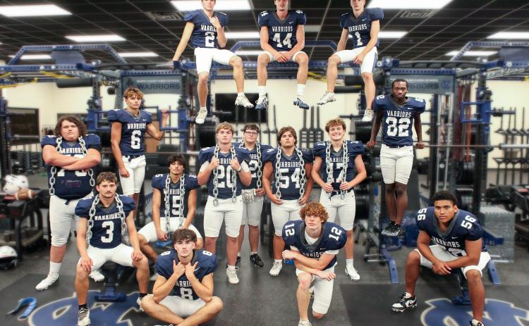 The senior members of the WCHS football team are, seated from left, Chris Nunnally, Casey Crane, Reese McGuire, Kody Tuhey and Josiah Williams; standing, Cayden Ashworth, Savion Anderson, Jack Johnson, Jbo Kastner, Mikey Moreno, James Hart and DeMarcus Wilds; top, Zach Godfrey, Sam Harkins and Gaines Clark. WCHS Football Preview cover photo by Staci Sulhoff/Special