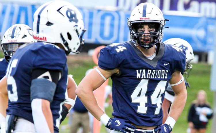 Senior Sam Harkins, above, and the Warriors' defense will try and slow down the Bobcats' potent offense in the region opener. STACI SULHOFF/SPECIAL