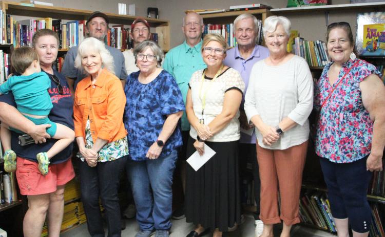 Front row, from left, Gina Sherman, Gail Smith, Jackie McDaniel, Amanda Lammers, Kim Sosebee and Tami Tarell. Back row, from left, Frank Norrell, Matthew Norrell, Tim Skidmore and Gene White. The group is pictured at the Community Thrift Store in Cleveland during the Sept. 17 grant awards. CARLY HENDERSON/WCN