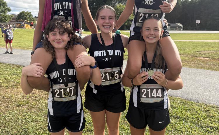 The middle school program had five runners place in the Top 10 at the NGML championships last week in Ellijay. Shown are, bottom from left, Jace Caudell, Wynn Whitlark and Lizzie Parker; top, Callen Fain and Jules Harris.  WCMS XC/SPECIAL